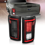 15-17 Ford F-150 ANZO 311294 Full LED Tail Lights - Black Smoke Lens w/ Sequential Signal (Red Light Bar)